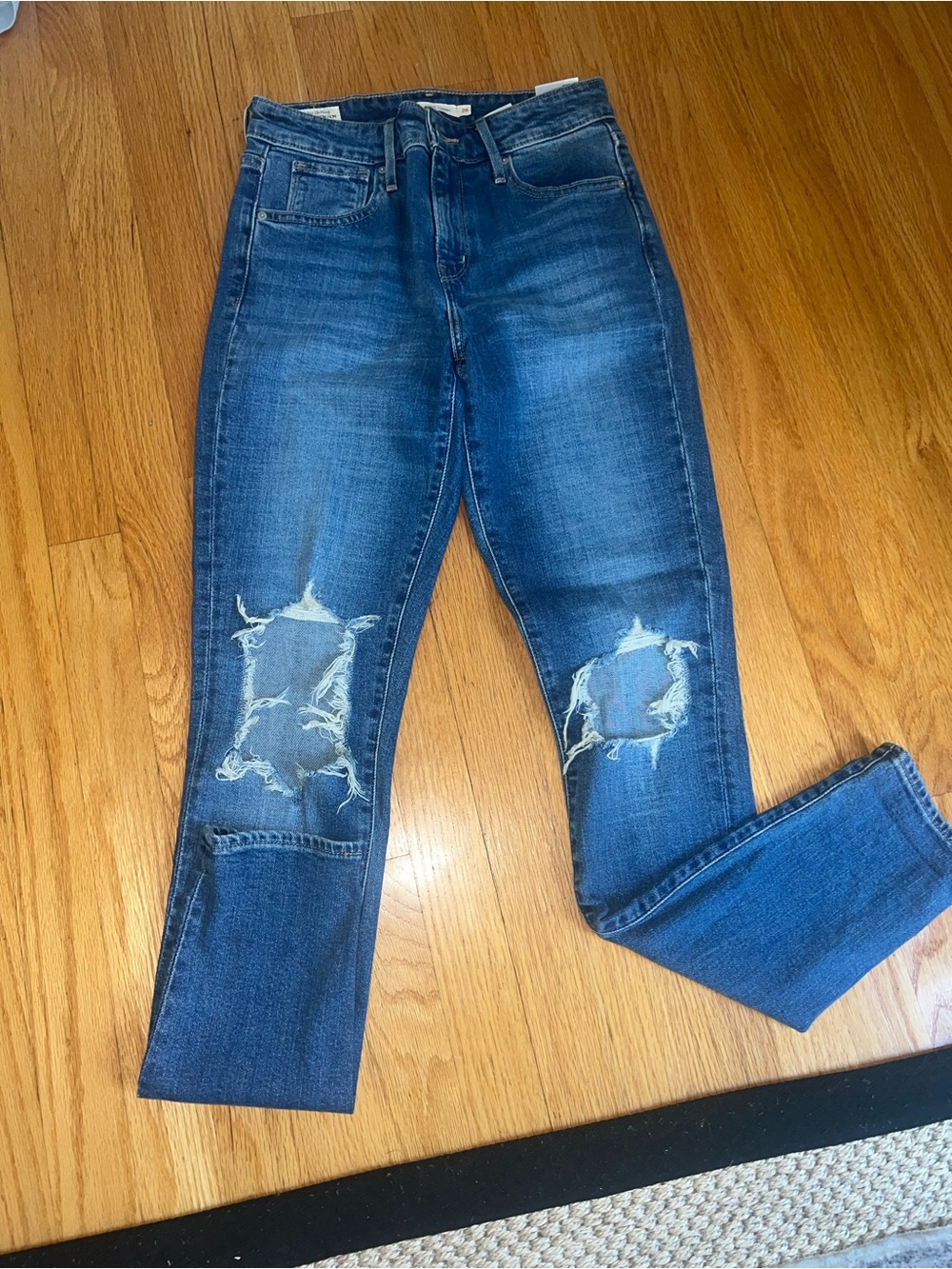 Levi's Blue Straight Leg Jeans with Knee Rips